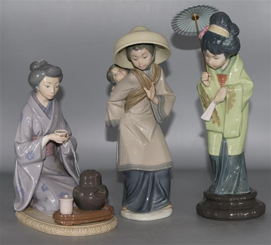 A group of three Lladro Japanese figures